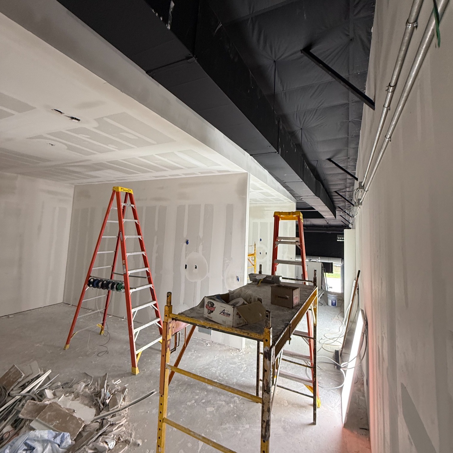 Drywall? Up. ✅
Paint? Starting in the next day or two. 🎨
Us, training in this building? Closer than ever. ⛳
The space is finally starting to feel real.
Bonus: the view from our mezzanine window today. Shoutout to our neighbors at @Whataburger across the street &mdash; Founding Members, you already know where the post-round run is happening. 🍔
📍 25903 Elmfield Drive, Spring, TX
