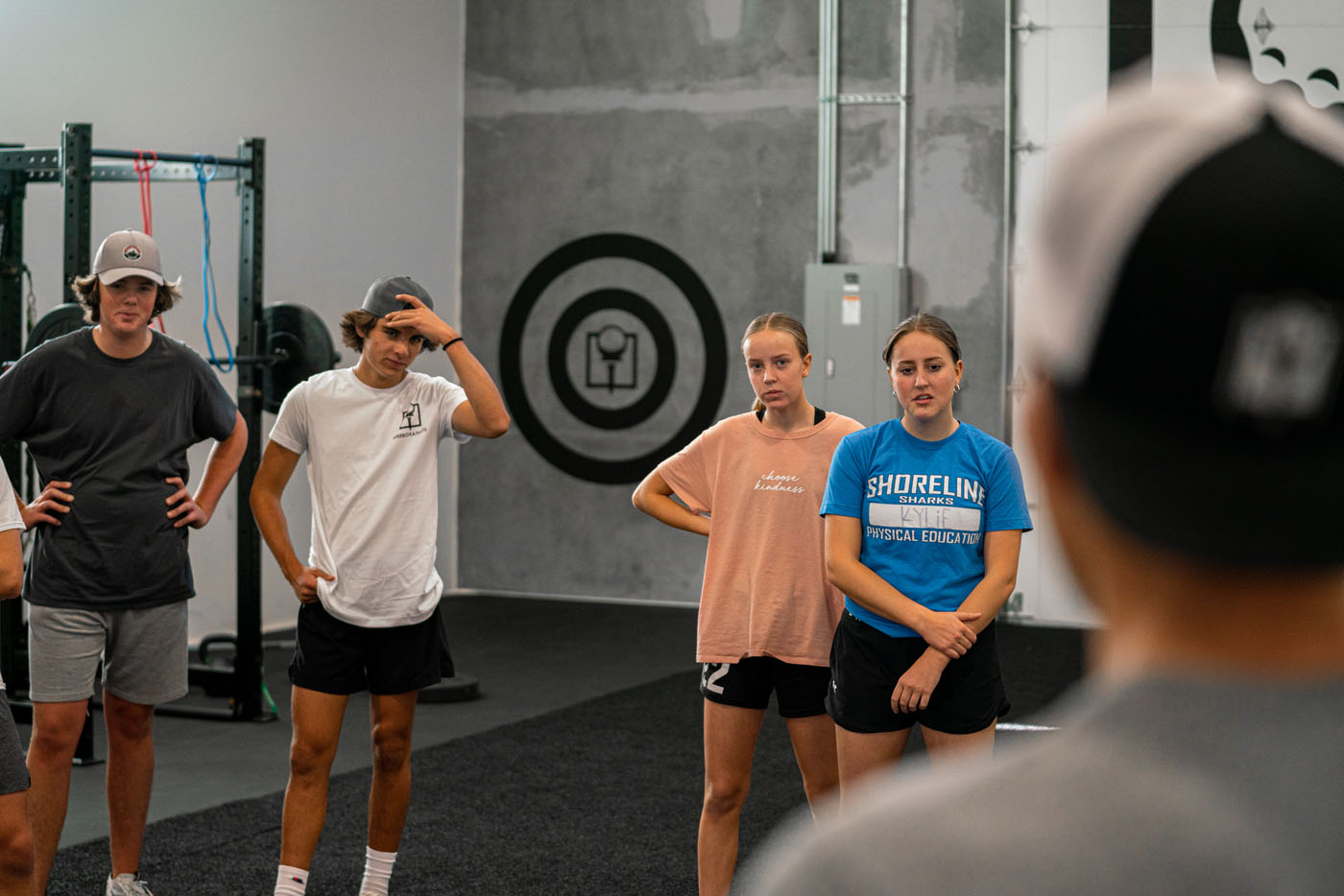A group of younger golfers at Tee Box golf training.